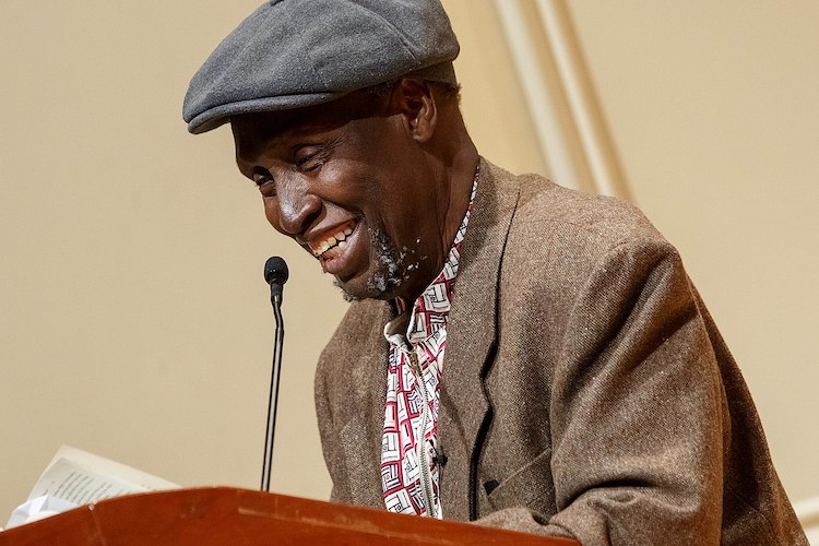 Photo: Renowned Kenyan writer Ngũgĩ wa Thiong'o reads excerpts from his recent work in both Gikuyu and English during a presentation in the Coolidge Auditorium, May 9, 2019. Photo by Shawn Miller/Library of Congress.