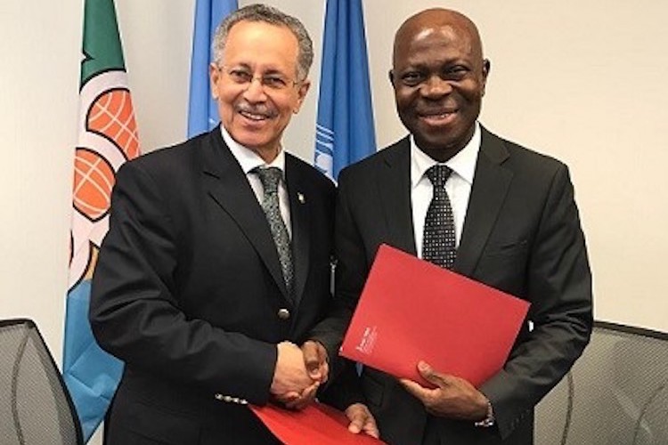 Photo (left to right): ACP Group Secretary-General Dr Gomes and IFAD President Houngbo exchange letters of intent to strengthen cooperation. Credit: ACP